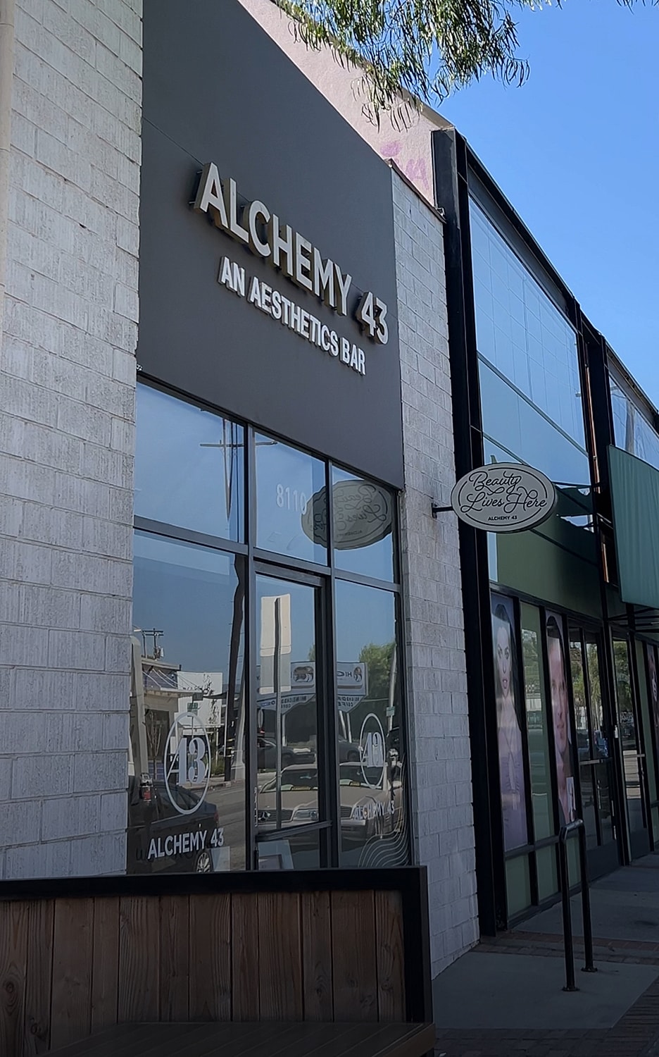 Aesthetics bar storefront on a sunny day.