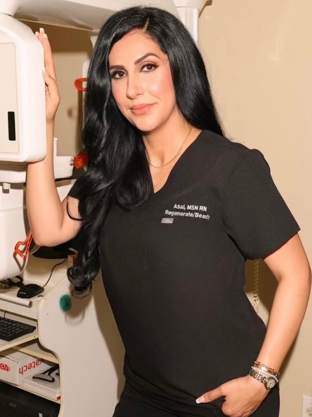 Health professional posing in clinic setting.