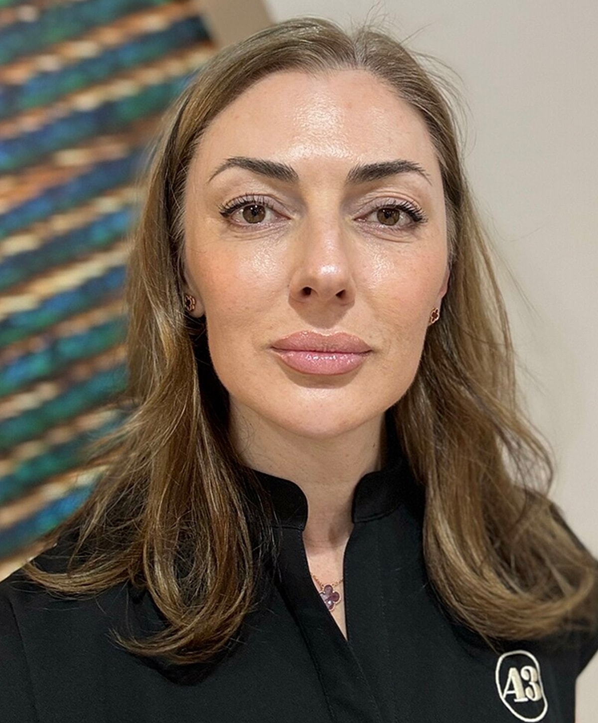 Portrait of a woman with long hair.