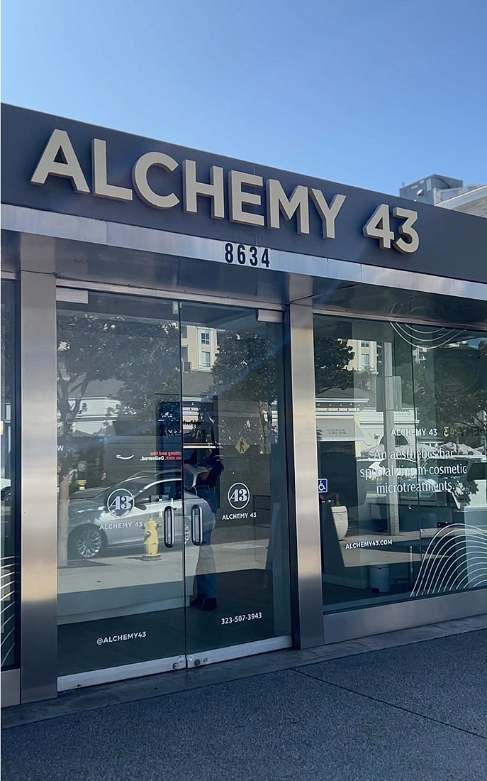 Facade of Alchemy 43 aesthetic bar storefront.