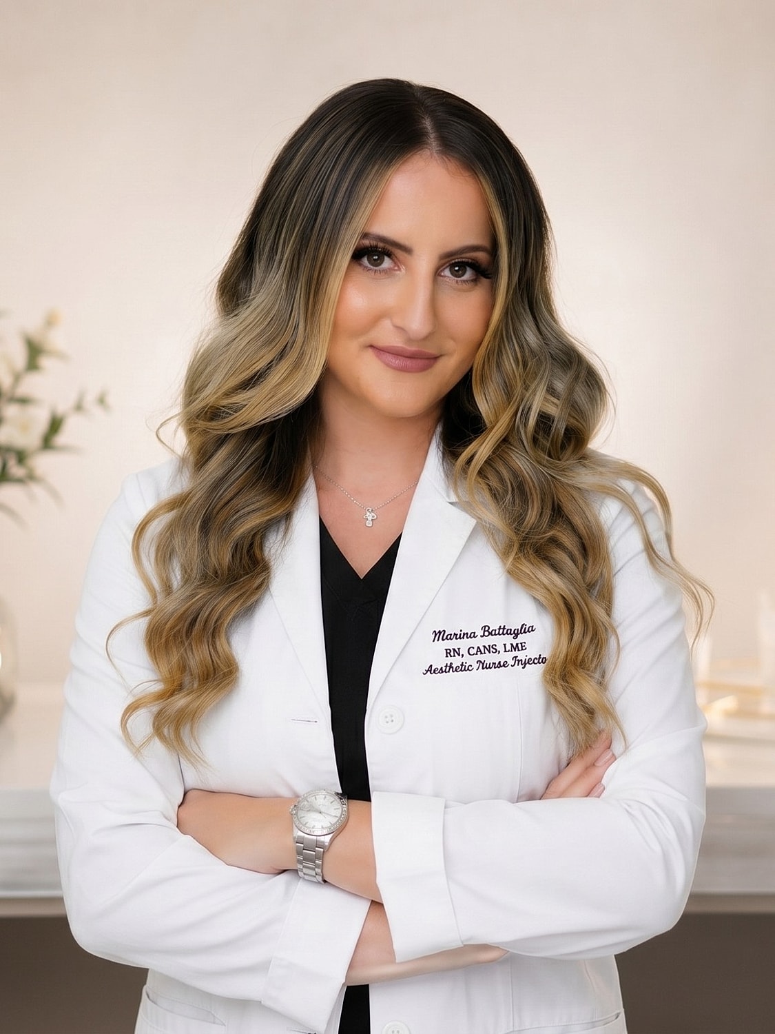 Aesthetic nurse in professional attire, smiling confidently.