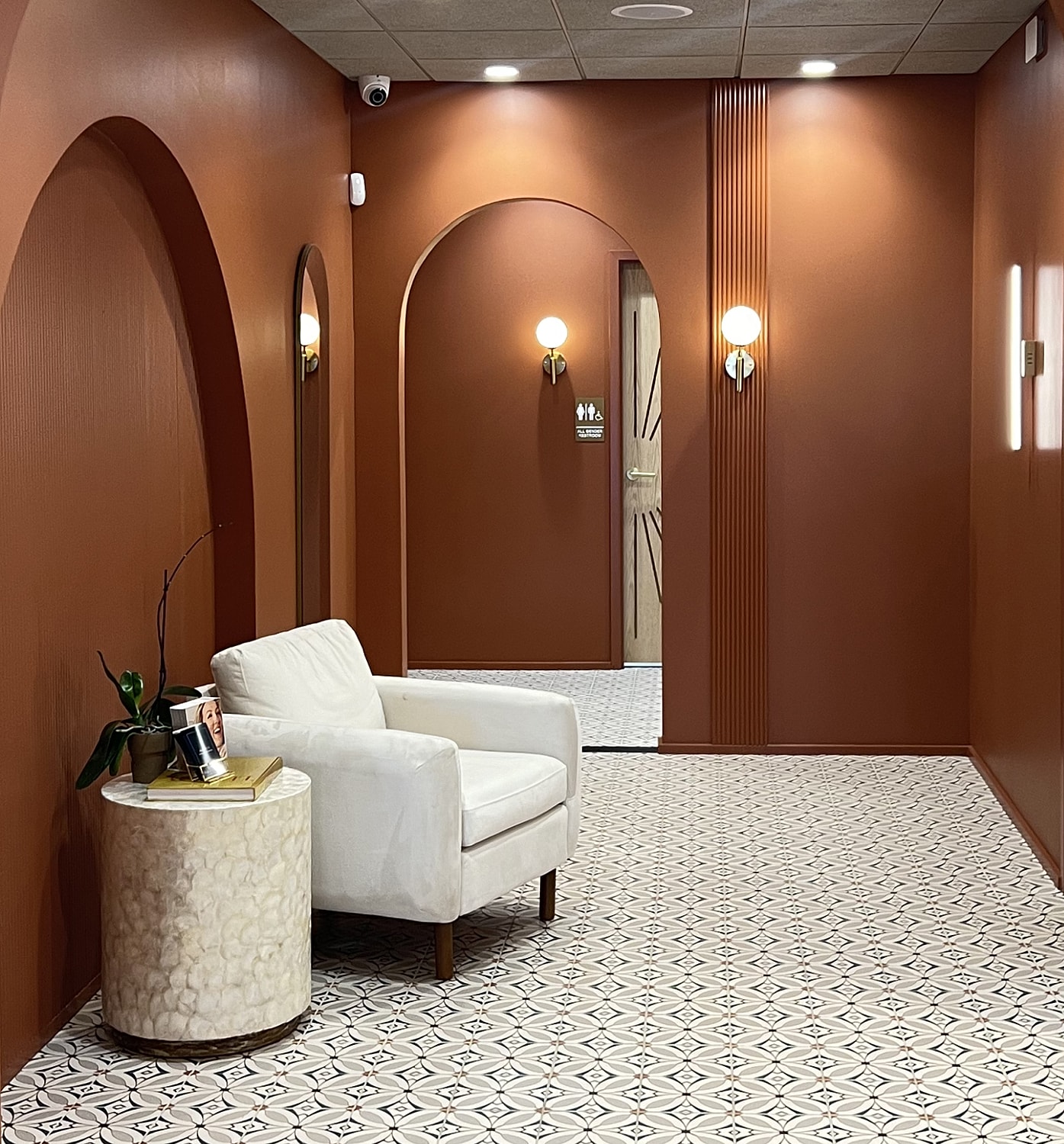 Wall sign of Alchemy 43 salon interior.