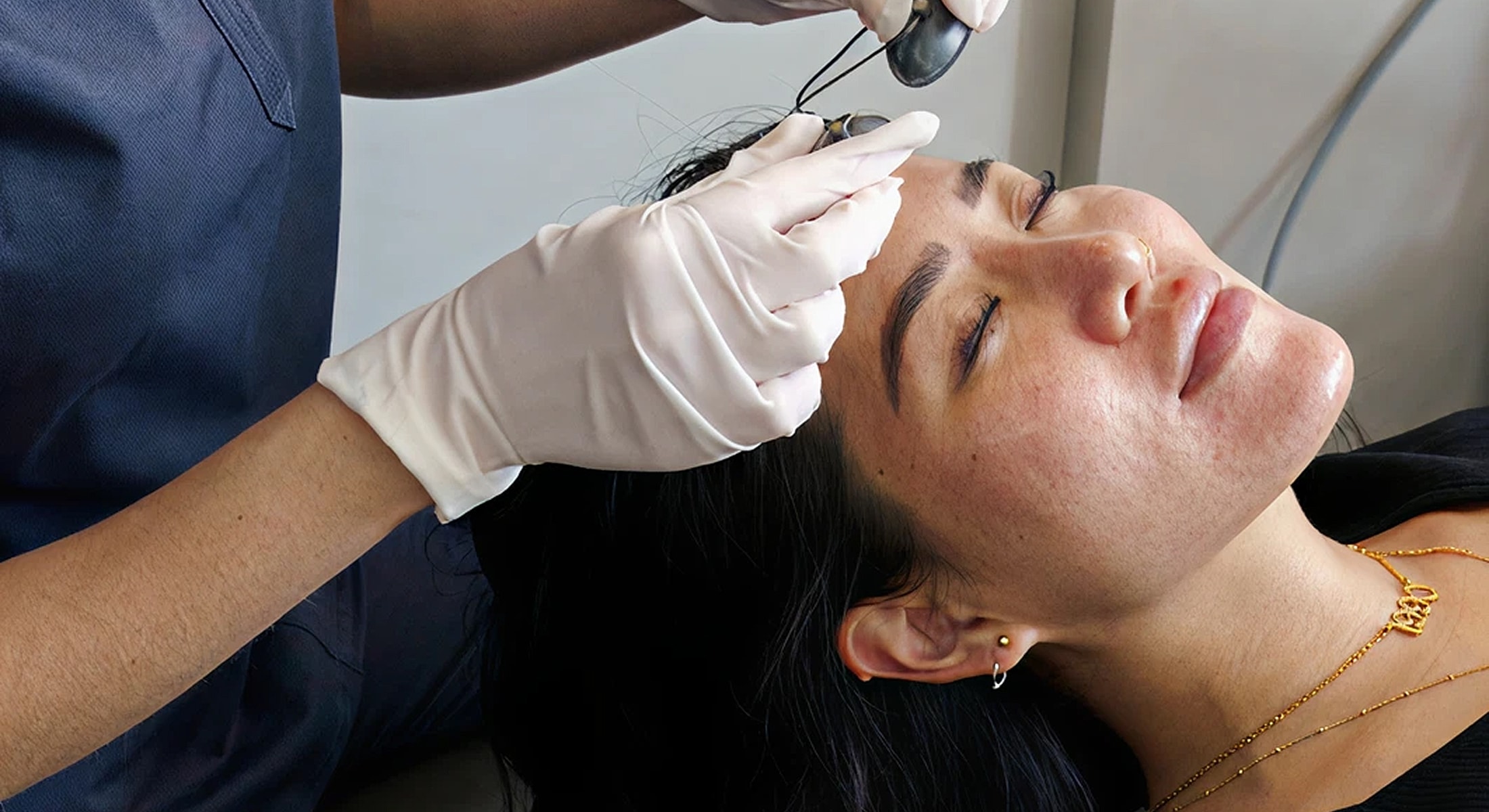 Facial treatment in progress with professional care.